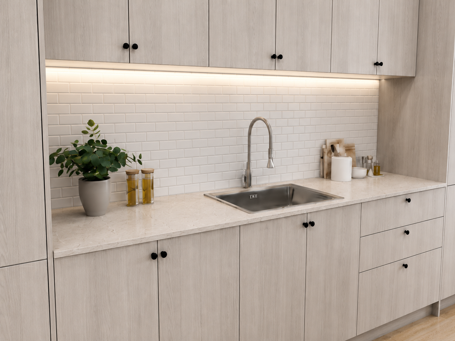 Appliances are fully integrated within the cabinetry, maintaining clean sightlines and a cohesive, uninterrupted surface.